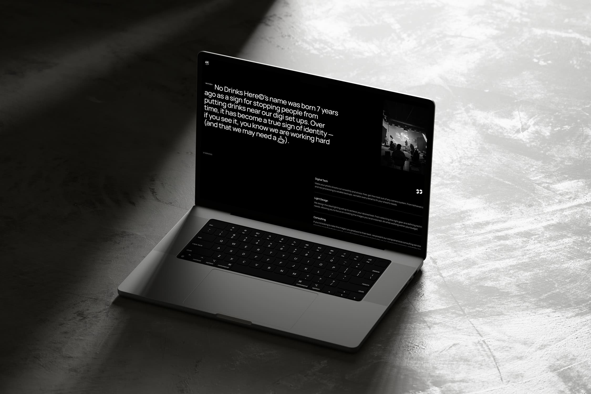 mockuuups-macbook-pro-mockup-on-textured-rock-surface